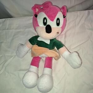 Pink Plush Character Doll with Green Top and Peach Skirt